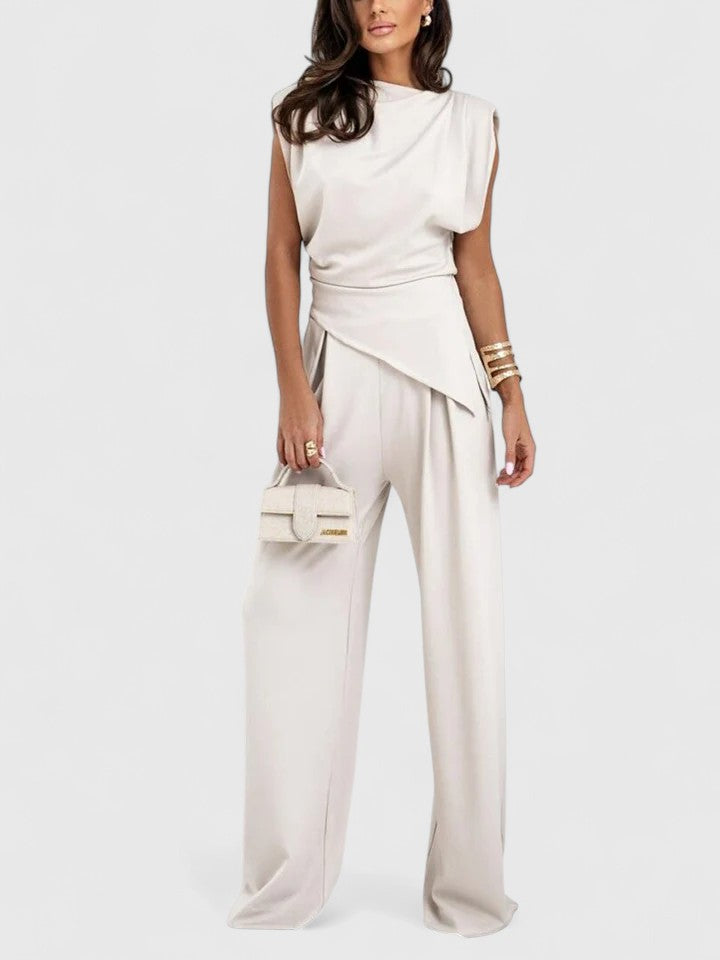 Conjunto de mujer elegante de dos piezas: top sin mangas y pantalón fluido, ideal para primavera-verano.