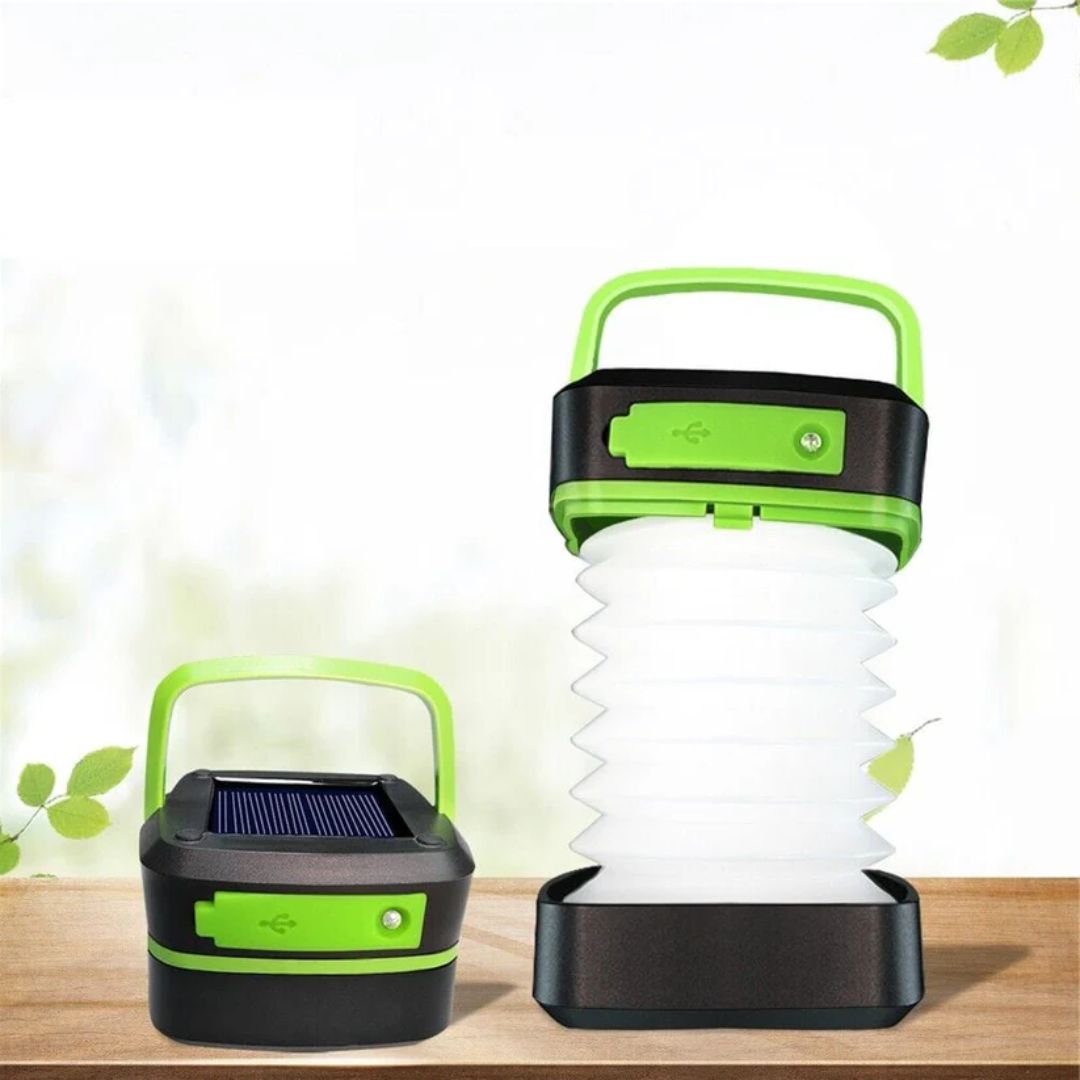 Linterna solar LED recargable verde para camping. Luz portátil plegable, ideal para senderismo y emergencias.