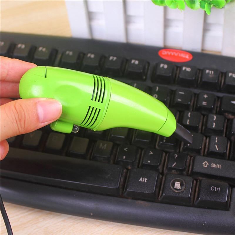 Aspiradora USB para gadgets, alimentada por USB. Ideal para limpieza de dispositivos electrónicos y mantenimiento PC.