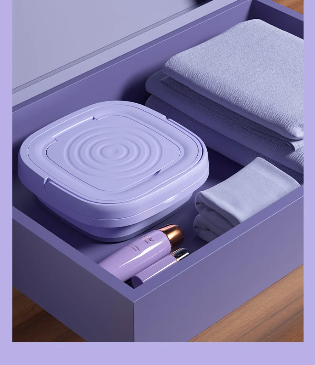 Lavadora portátil para ropa delicada, ideal para prendas pequeñas, con bajo consumo de energía.
