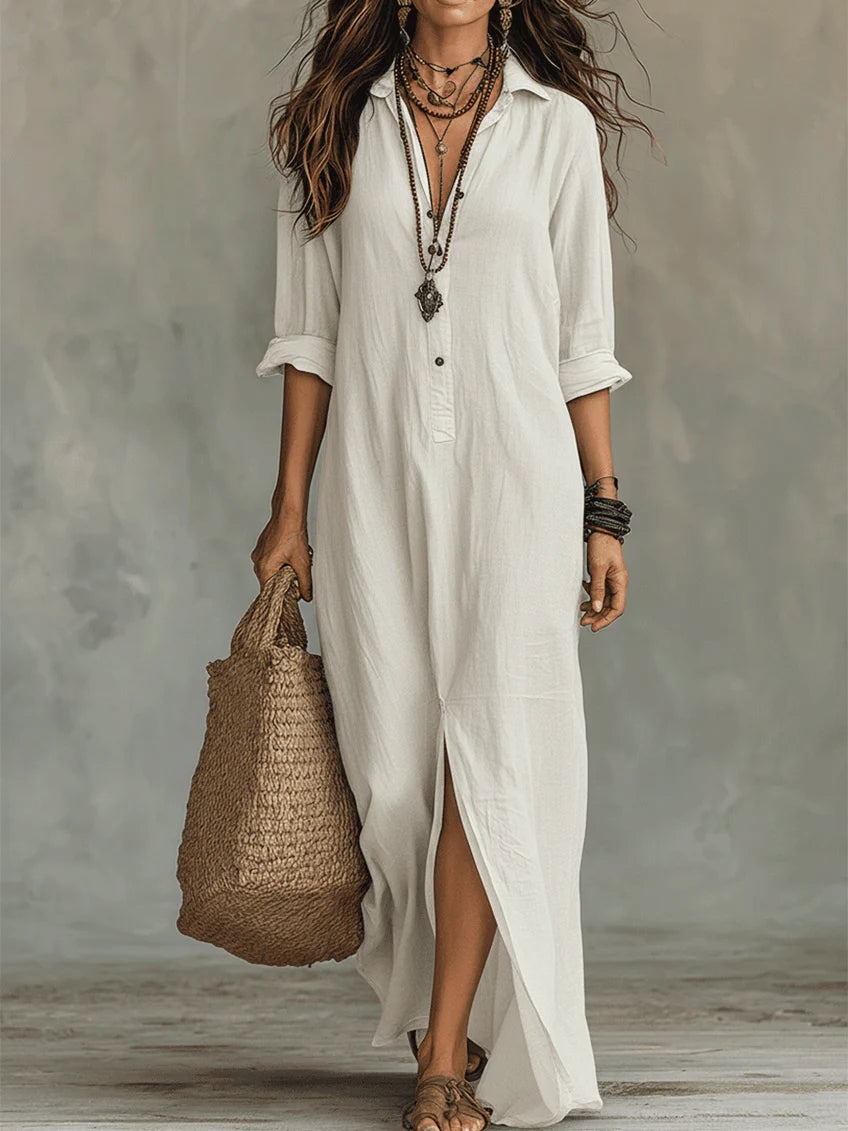 Mujer luciendo vestido largo camisero fluido color neutro. Estilo atemporal y versátil para primavera y verano.