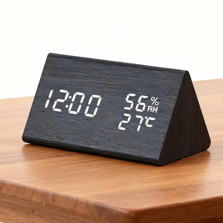 Moderno reloj despertador con pantalla HD, elegante para cualquier mesita de noche.