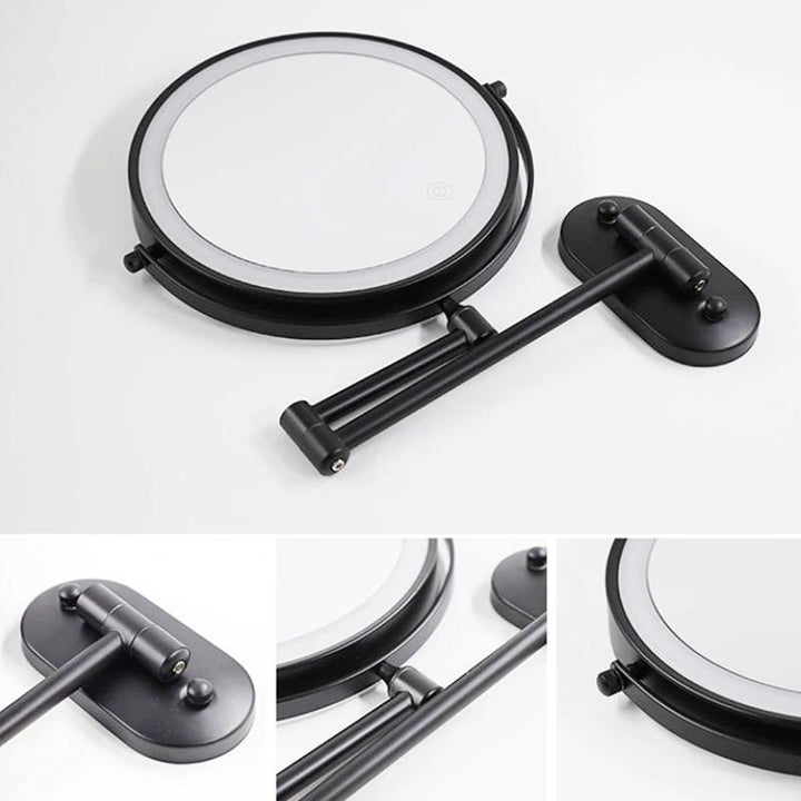 Lámpara espejo de pared negra con aumento y luz LED regulable, esencial para belleza, baño y maquillaje.