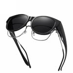 Montura negra, lentes grises