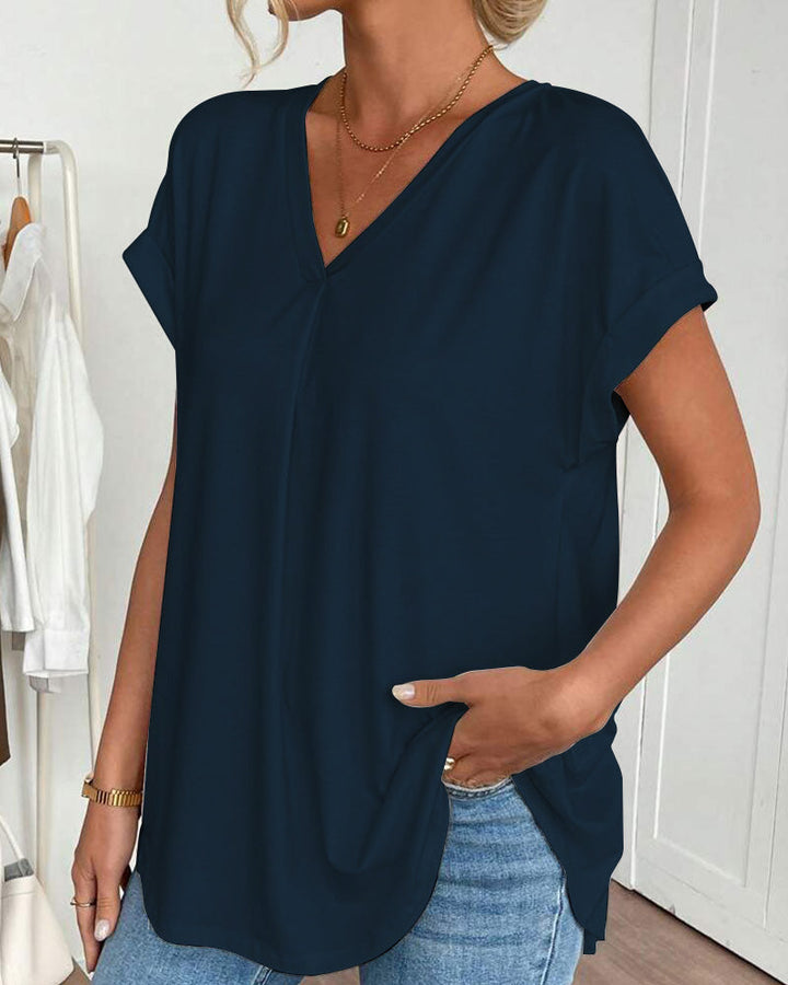 Top femenino casual con escote en V y mangas dobles. Combina comodidad y estilo para mujer.