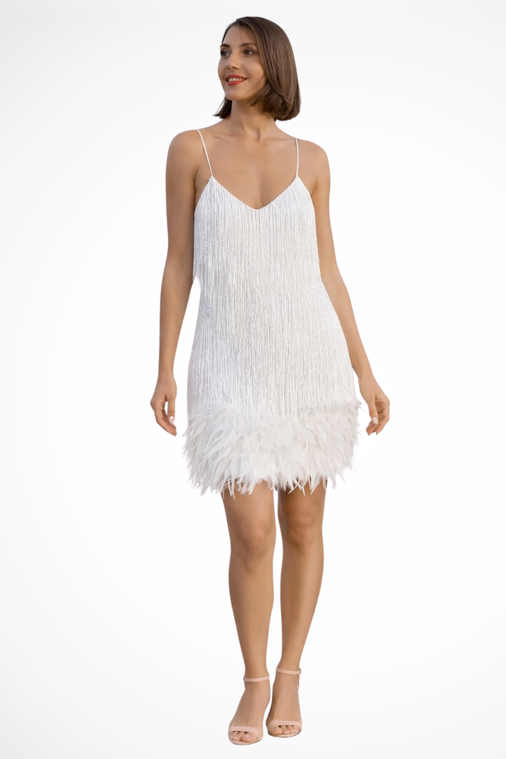 Moda femenina: Vestido de cóctel sin mangas con flecos, ideal para fiesta y baile con estilo y movimiento.