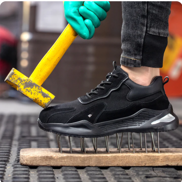 Suela antideslizante de zapatillas de seguridad negras, calzado de trabajo urbano que ofrece agarre y protección.