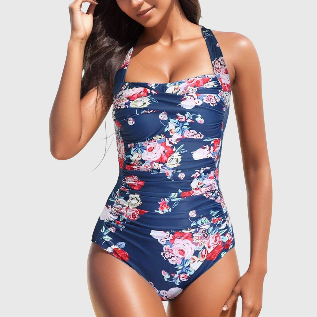 Bañador deportivo de una pieza para mujer, espalda abierta. Ideal para natación, piscina o playa.