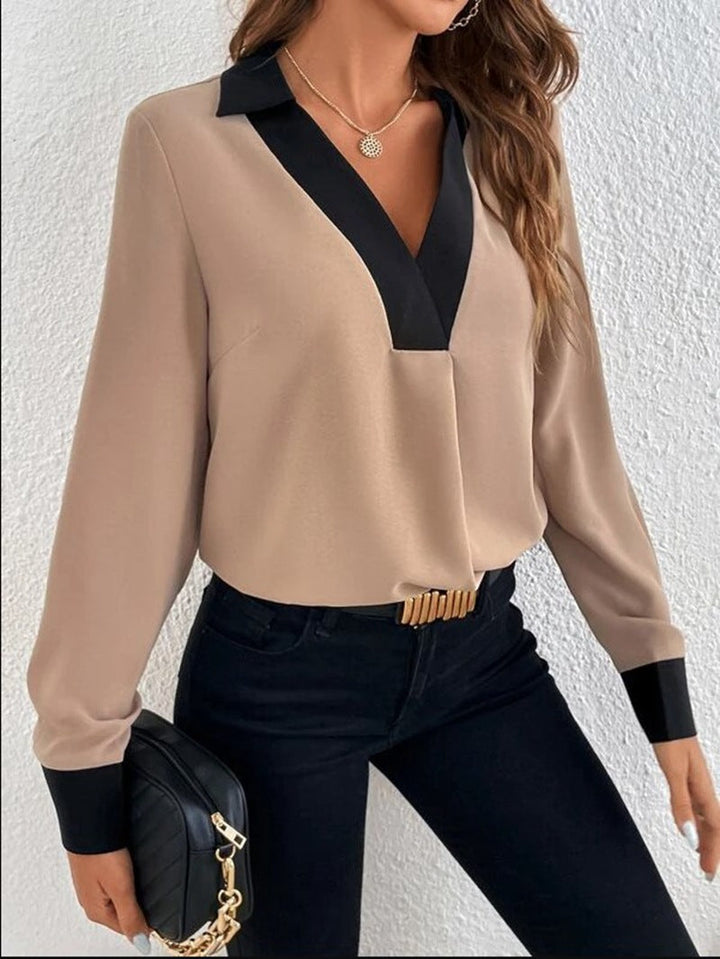 Blusa casual de manga corta para mujer, con cuello V y diseño de contraste, estilo moderno.