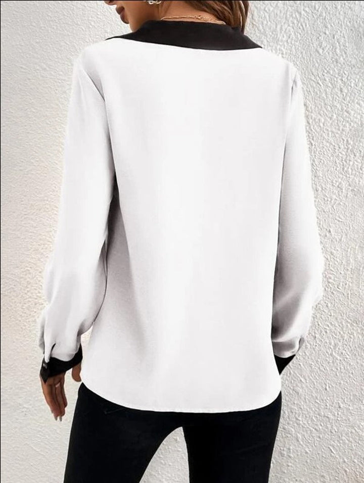 Camisa de manga corta para mujer, diseño casual con cuello V y paneles de color en contraste.