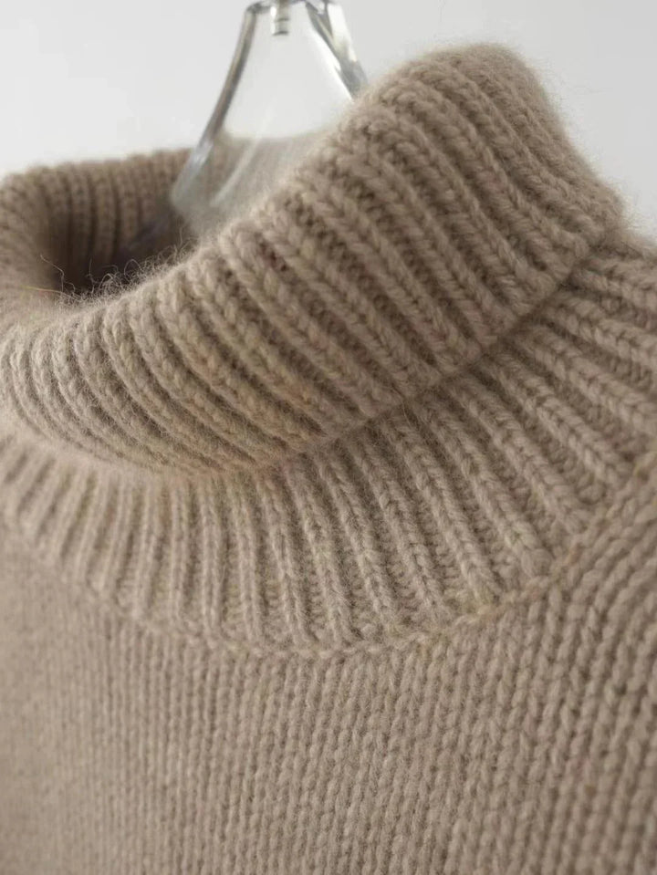 Jersey de cachemir premium para mujer, cuello alto, confort y moda atemporal en una prenda.