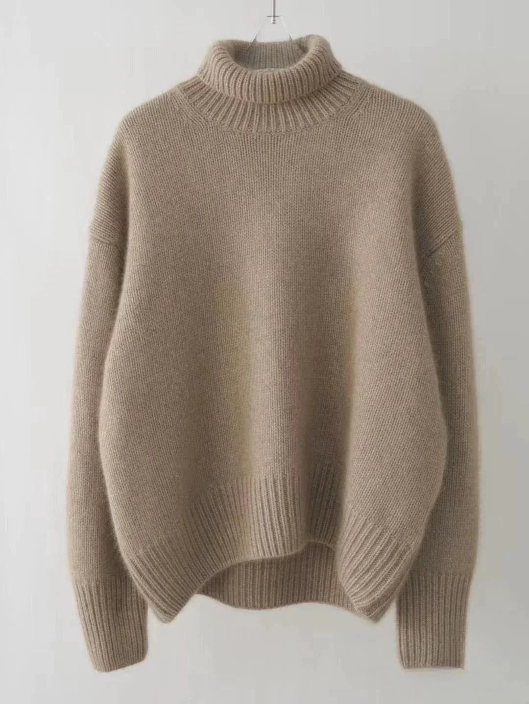 Suave y cálido jersey de cachemir para mujer, cuello alto, perfecto para el frío invernal.