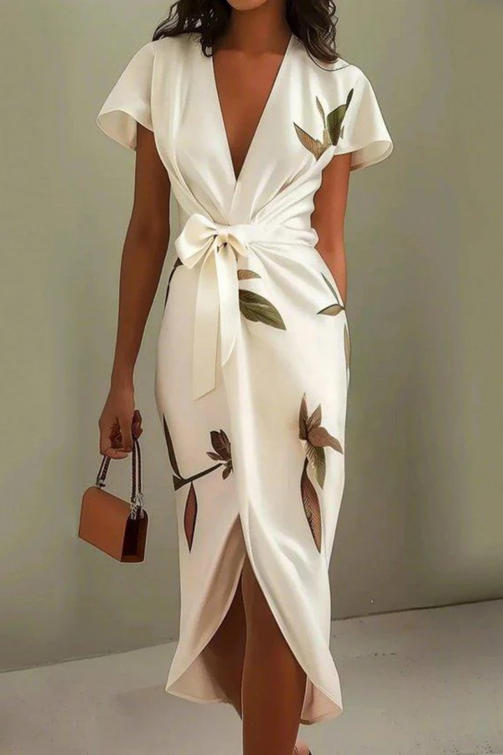 Vestido elegante midi para ocasiones especiales de verano, estilo cruzado y fluido.