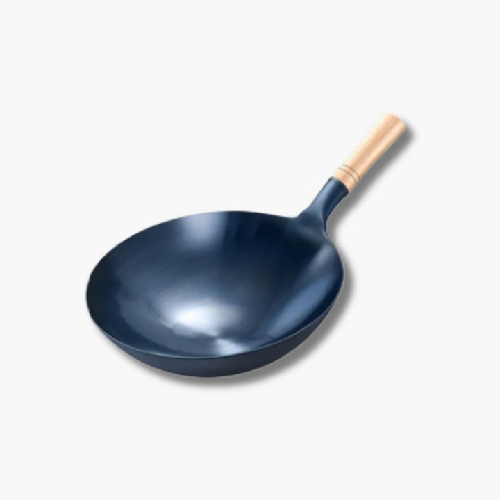Wok de hierro fundido Cuyun antiadherente. Ideal para cocinar de forma saludable y saltear tus platos favoritos.