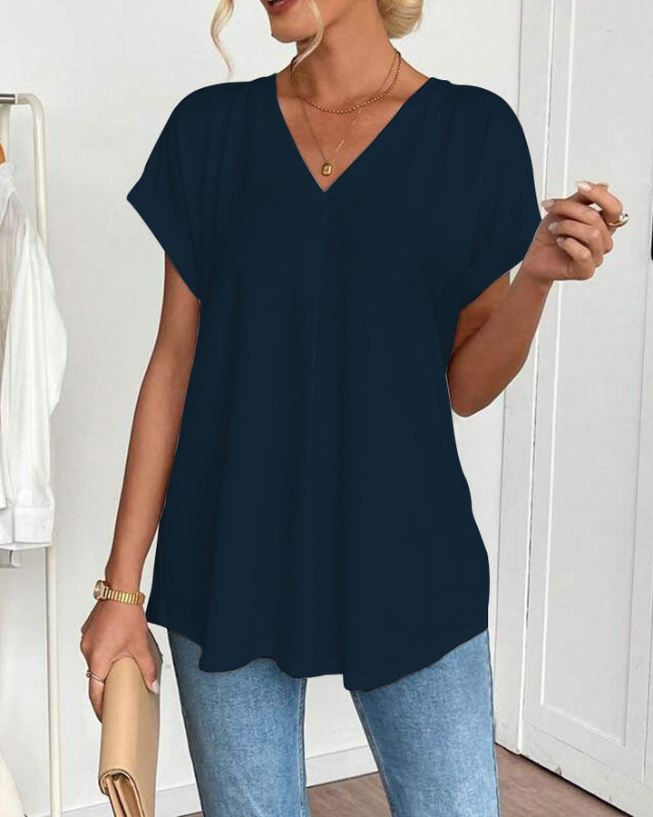 Top con escote V y mangas dobles. Blusa femenina casual, ideal para el verano y comodidad.