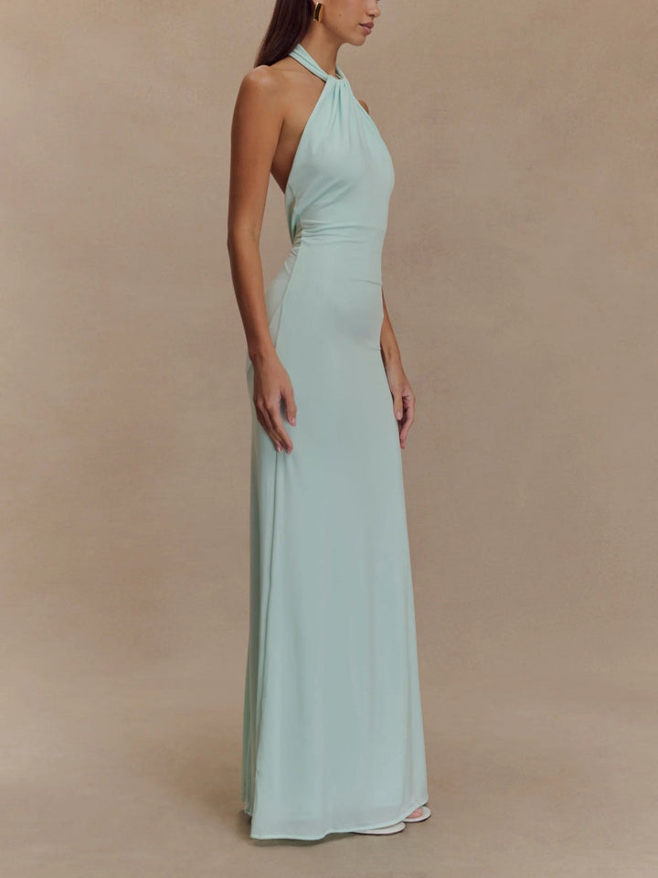 Vestido de mujer largo con cuello halter, silueta entallada y sexy espalda descubierta. Ideal para ropa de fiesta.