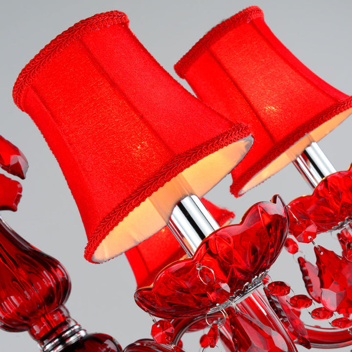 Lámpara de araña Aurelia con brillo único. Cristal carmesí, luz de techo elegante y moderna para el hogar.