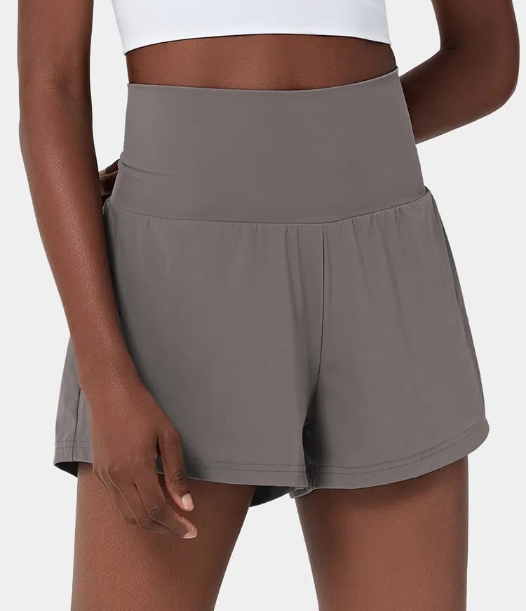 Short deportivo mujer, cintura alta, bolsillos, ideal para gym y actividades.
