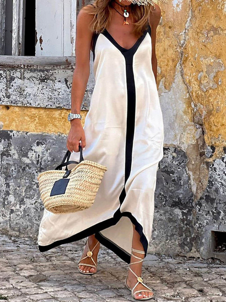 Vestido maxi de verano para mujer con ribetes contraste, elegante y fresco.