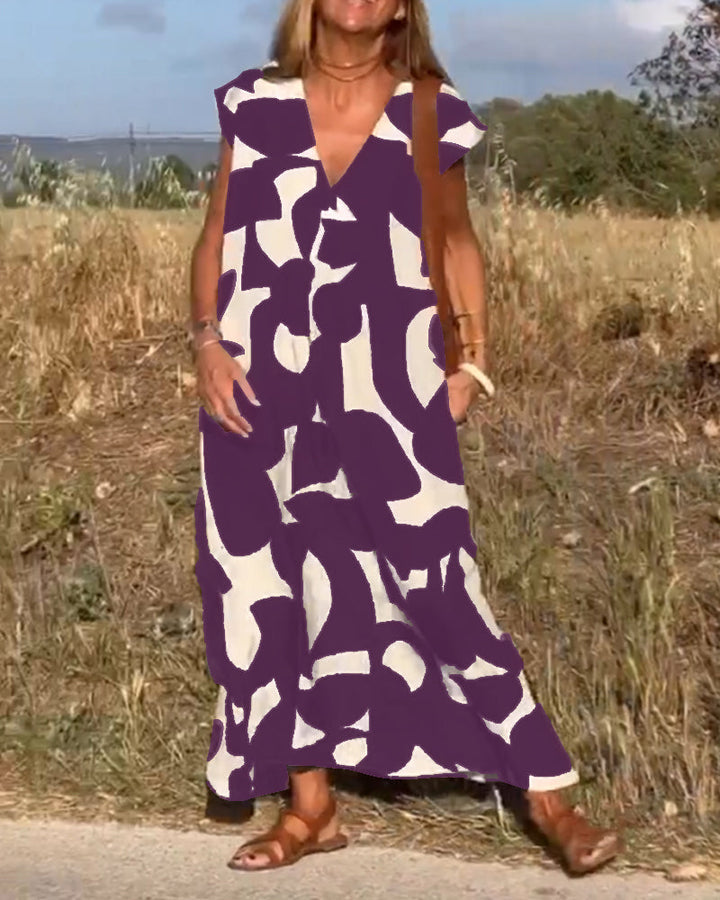 Vestido de mujer casual-elegante, estampado floral fluido, escote V. Poliéster de manga corta.