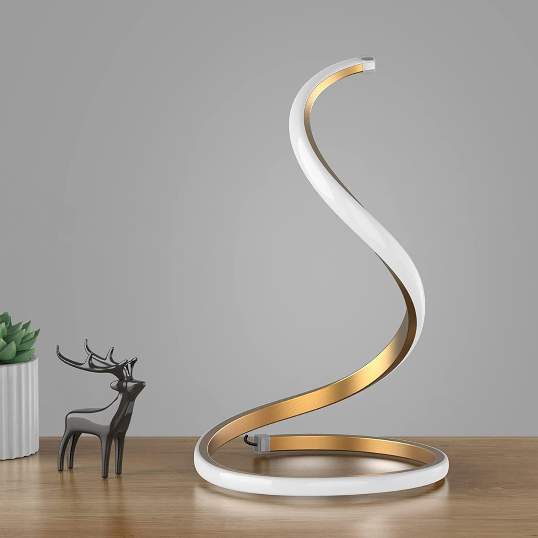 Lámpara de mesa LED de bajo consumo con diseño único en forma de S. Aporta iluminación moderna y decorativa a cualquier espacio.