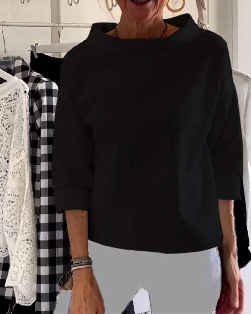 Camisa femenina elegante y versátil con cuello alto, ideal para mujer y cualquier ocasión.