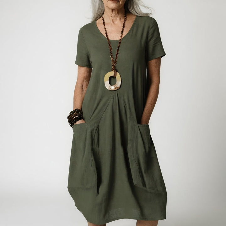 Vestido fluido elegante para mujer, estilo de verano cómodo con cuello redondo y silueta favorecedora.