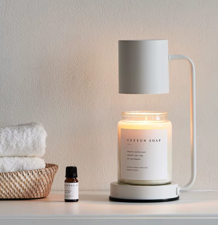 Lámpara de mesa calentadora de velas para fundir cera sin humo. Ofrece iluminación ambiental cálida y fragancia.