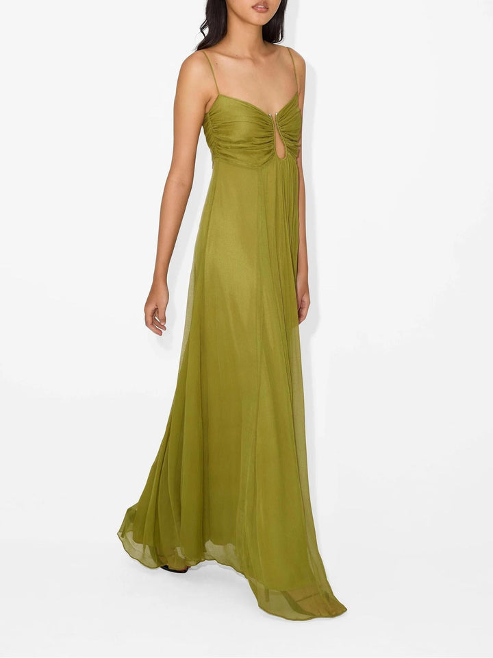 Vestido vaporoso de mujer con tirantes finos y detalles cut-out. Elegante para verano, playa o invitada de boda.