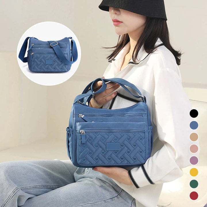 Bolso chic de mujer, perfecto para el trabajo o salidas informales, con estilo clásico atemporal.
