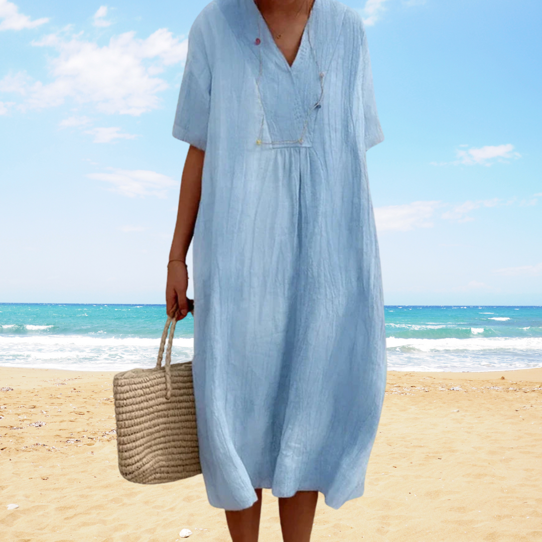 Vestido midi fluido de verano con escote en V para mujer, ideal para playa o casual, con estilo fresco.