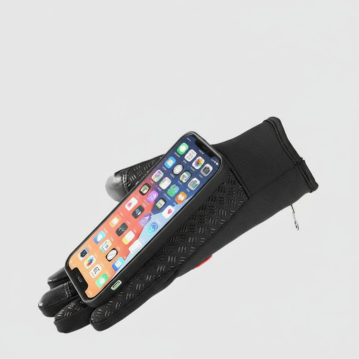 Par de guantes negros con palma antideslizante. Diseño táctil para uso en invierno y actividades con frío.