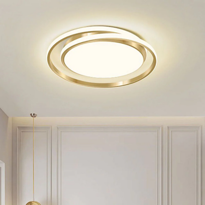 Sencilla y elegante lámpara de techo LED de diseño anillo, perfecta para una iluminación moderna y funcional en el hogar.