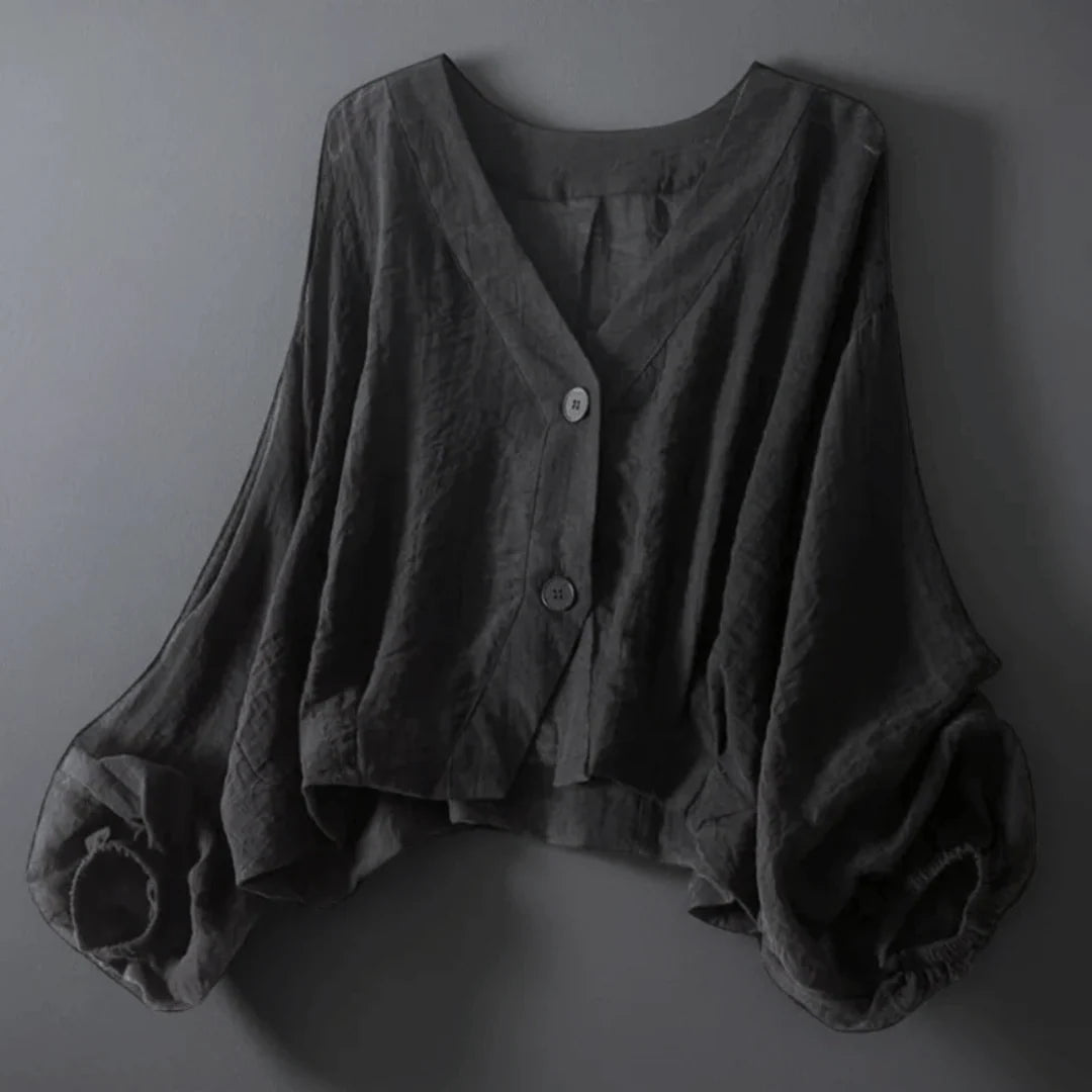 Blusa elegante transpirable para mujer con escote V y mangas globo. Ideal para primavera y verano.