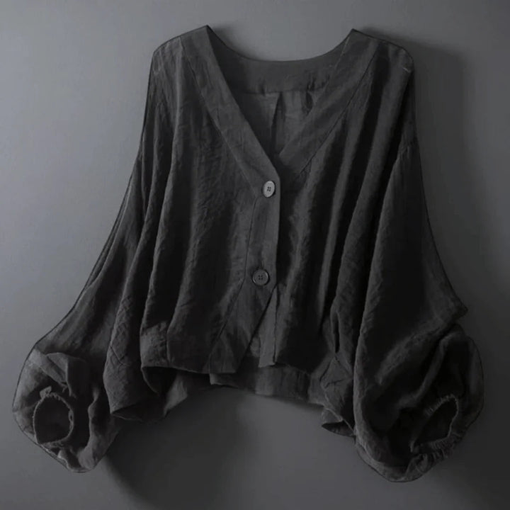 Blusa elegante transpirable para mujer con escote V y mangas globo. Ideal para primavera y verano.