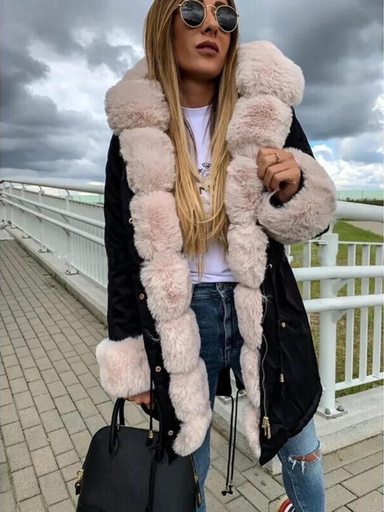 Escudo de lujo: Abrigo de invierno para mujer. Protección cálida y elegante contra el frío invernal.
