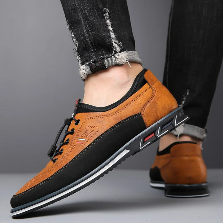Detalle de zapatos de vestir hechos a mano para hombre, piel de alta calidad, elegancia y confort duradero.