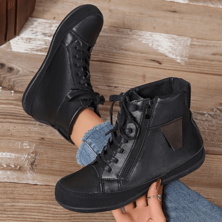 Botas de mujer altas y cómodas, con cremallera y estilo moderno. Perfectas para moda de invierno y otoño.