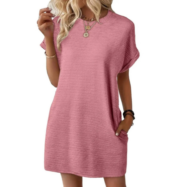 Vestido mini casual Sofía de mujer con bolsillos, tejido suave y fluido. Perfecto para el día a día de verano.