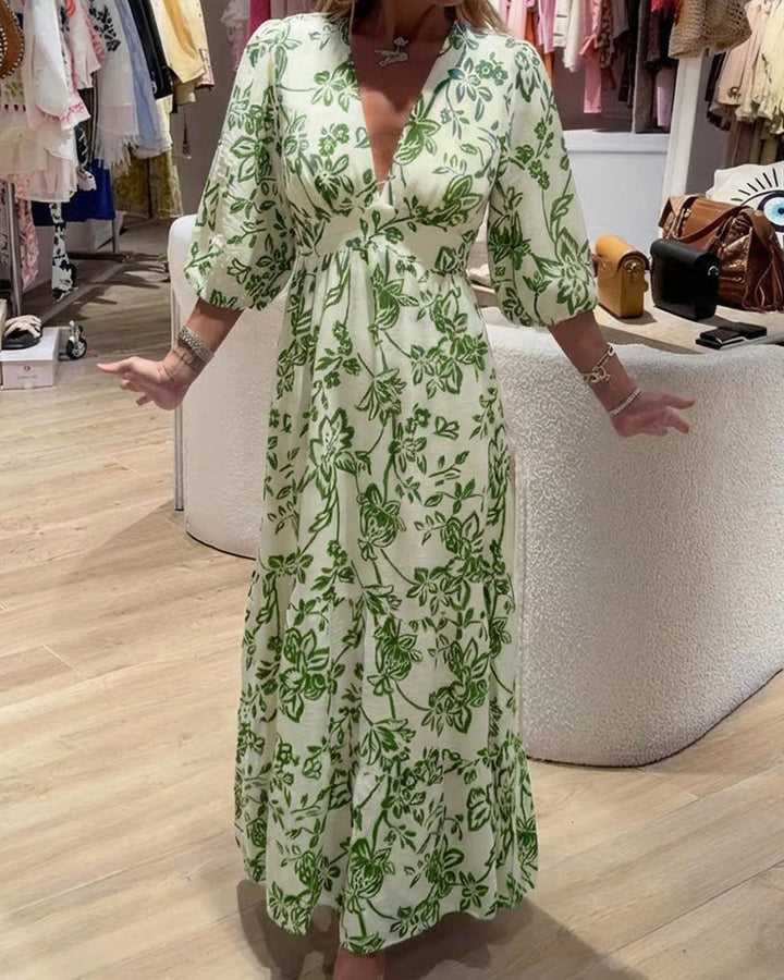 Vestido largo floral azul y verde para mujer, estilo elegante y fluido. Ideal para eventos casuales o de fiesta.