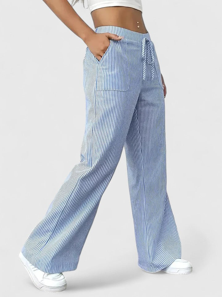 Pantalón ancho azul de mujer, cintura ajustable y tejido ligero. Cómodo para estilo casual.