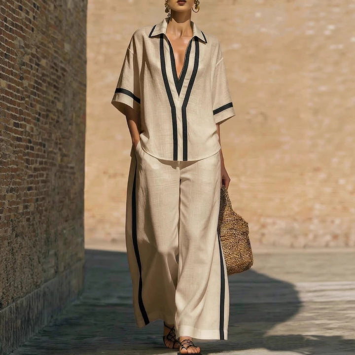 Mujer luciendo conjunto cómodo de dos piezas con pantalón ancho, perfecto para relax o estilo casual de verano.