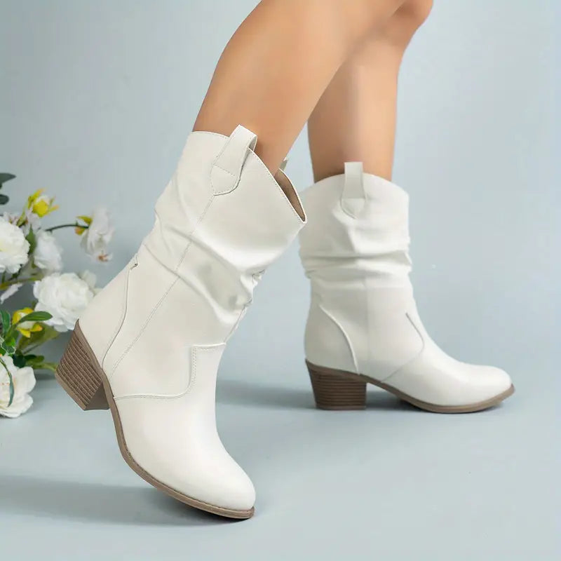 Botas femeninas elegantes, perfectas para un look formal de oficina o eventos de invierno.