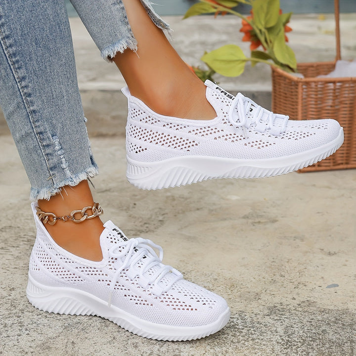 Calzado casual de mujer, zapatillas ligeras y transpirables en blanco, con amortiguación para el día a día.