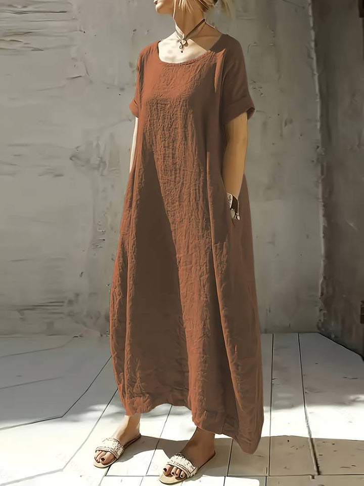 Vestido largo Lola para mujer, versátil y cómodo con mangas amplias, ideal para un estilo casual de verano.