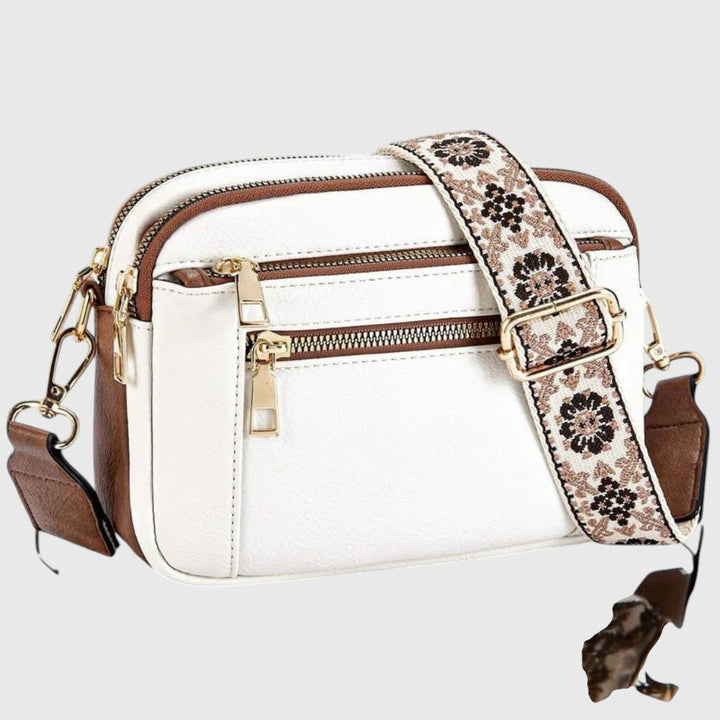 Bolso de hombro mujer con correa floral ajustable. Elegante accesorio de moda diario y casual.
