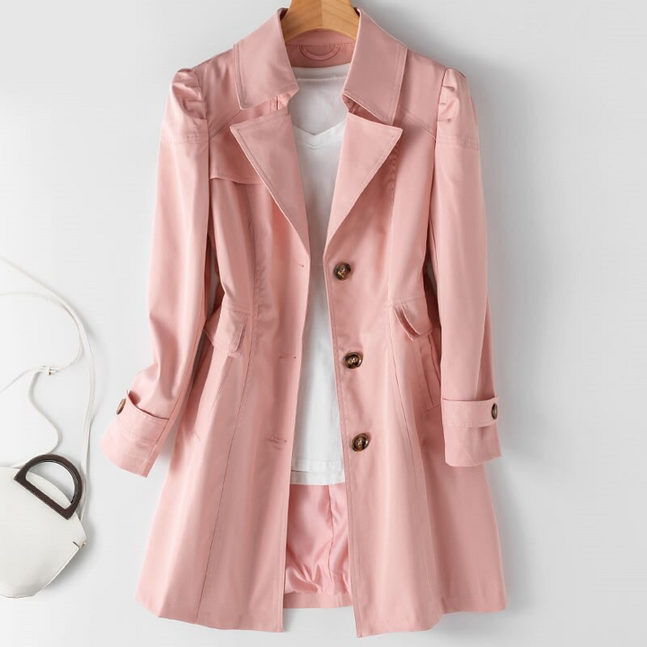 Gabardina de moda para mujer, estilo clásico. Presenta hombros acolchados y un único botón para un look chic.