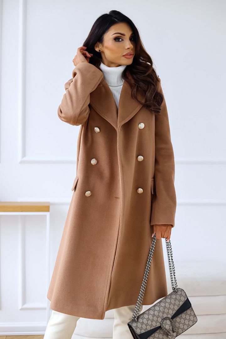 Abrigo de mujer con doble botonadura, estilo clásico y elegante, ideal para la temporada de invierno.