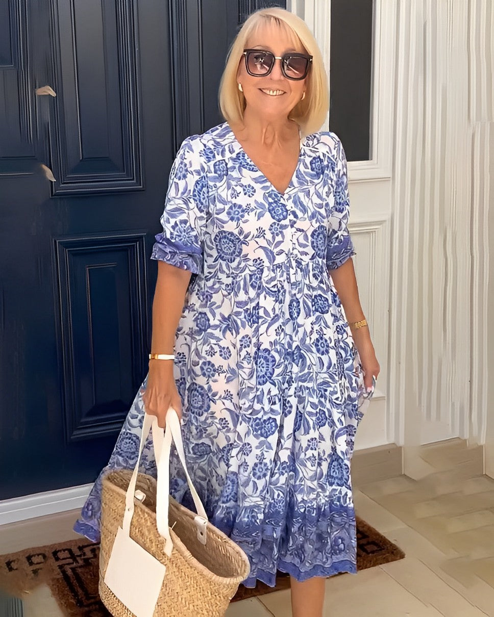 Vestido floral vibrante para mujer, ligero y transpirable. Estilo fluido, ideal para un look veraniego casual o elegante.
