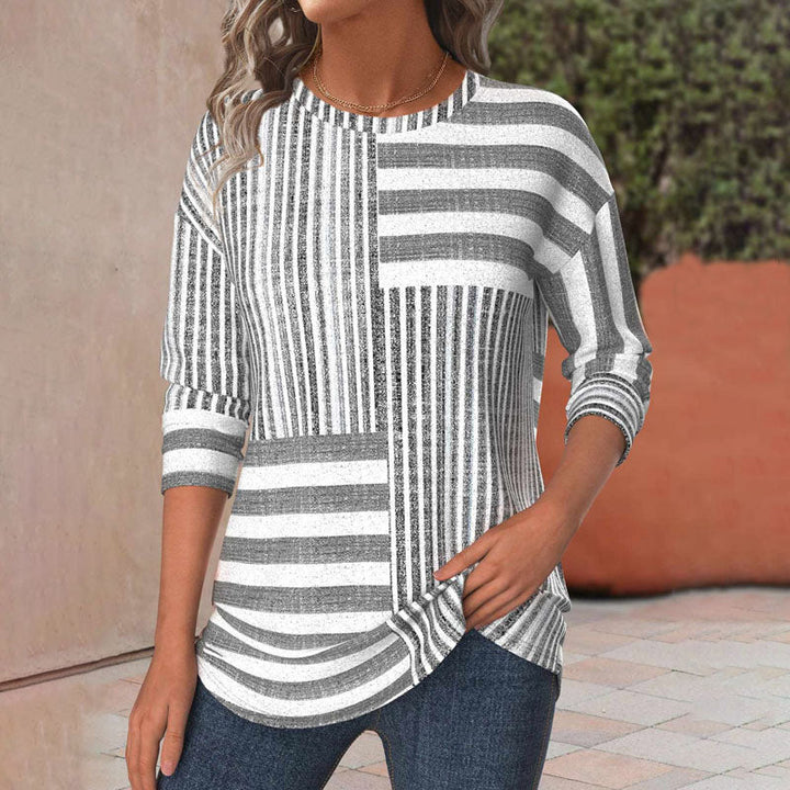 Camiseta rayada casual gris de manga larga para mujer, estilo moderno y versátil para tu día a día.